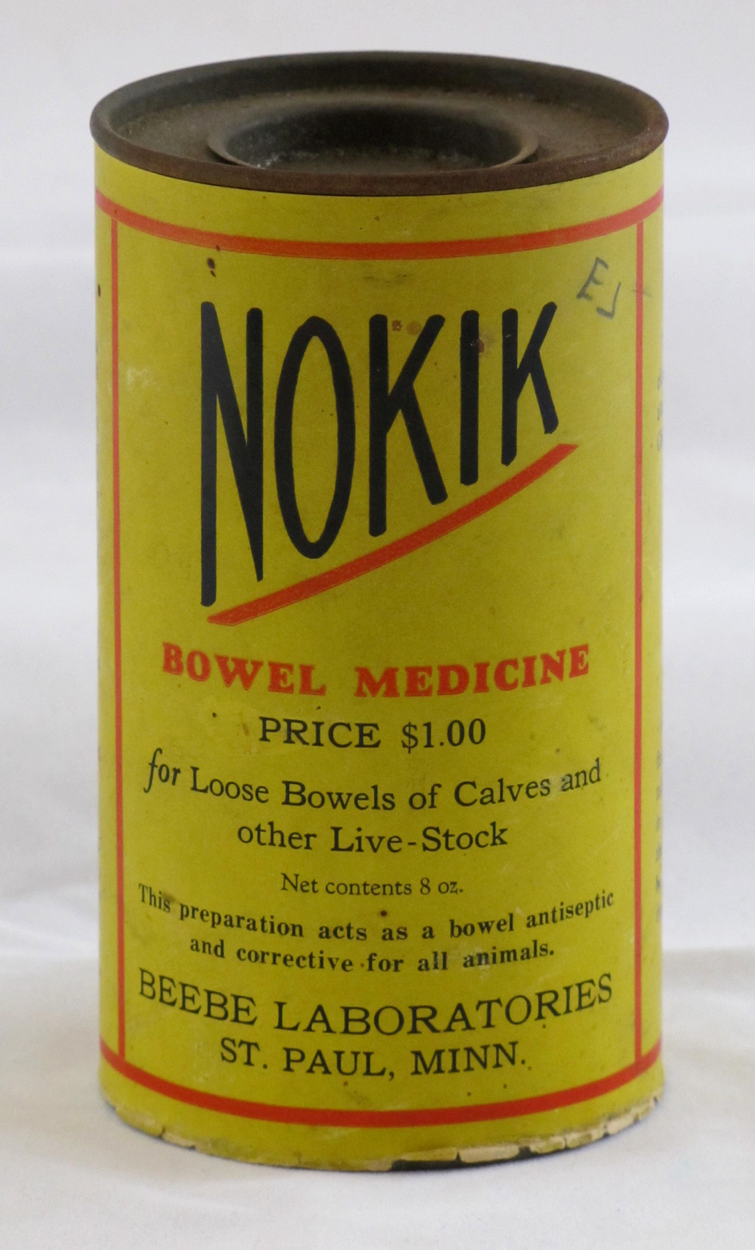Can of Nokik, used to cure loose bowels in calves and other livestock