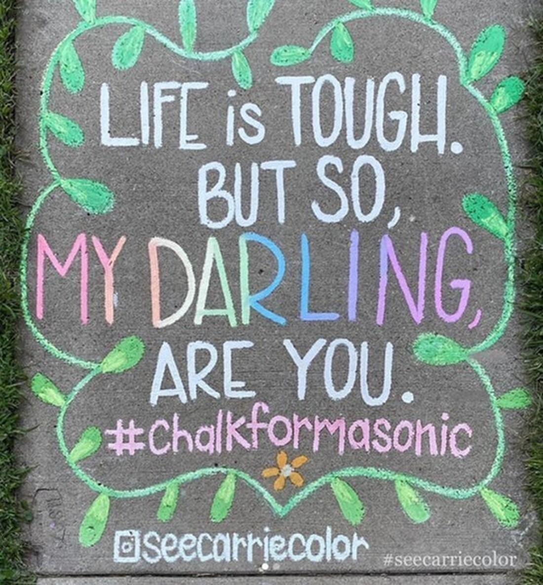 Chalk words: Life is tough. But so, my darling, are you.