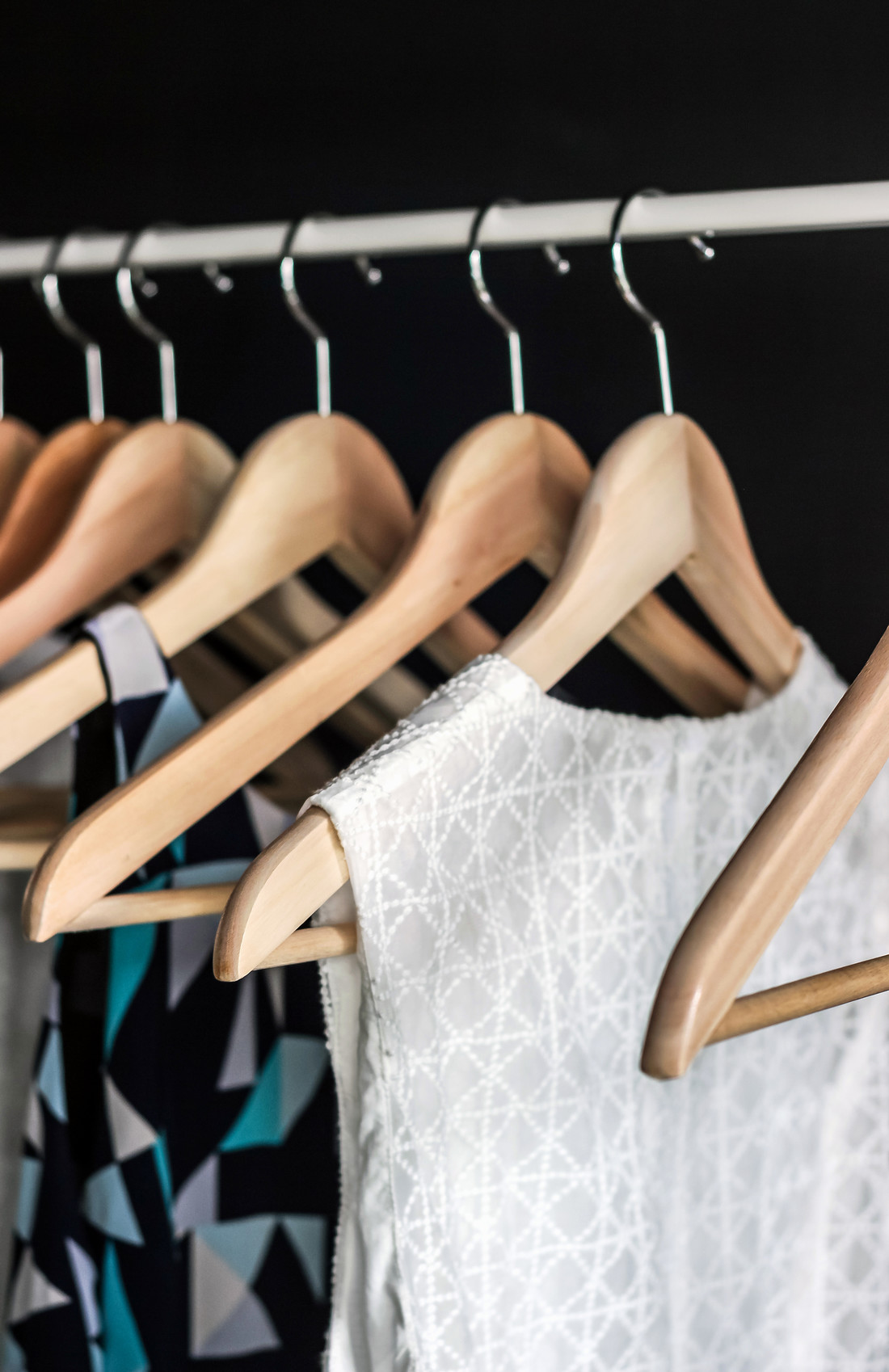 Image of clothes hanging in a closet